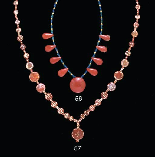 AN EGYPTIAN FAIENCE AND GLASS BEAD NECKLACE