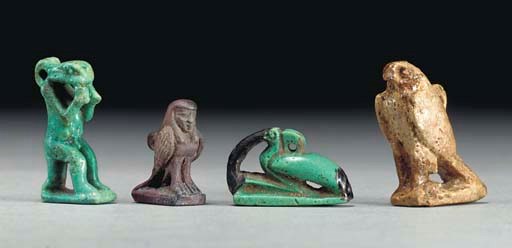 FOUR EGYPTIAN AMULETS