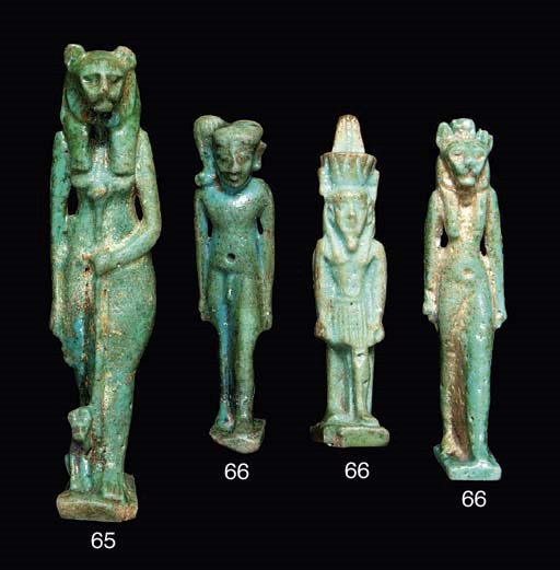 AN EGYPTIAN FAIENCE AMULET OF SEKHMET
