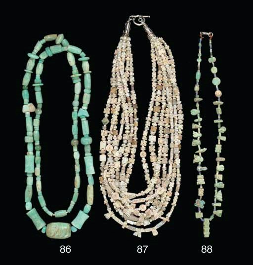 A WESTERN ASIATIC WHITE STEATITE BEAD NECKLACE