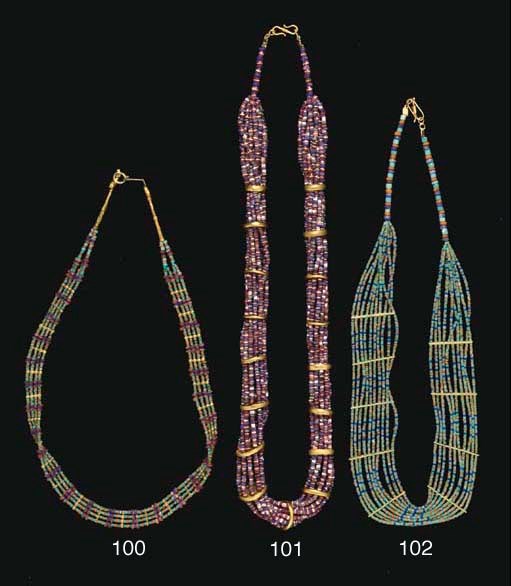 A NEAR EASTERN GOLD, STONE AND GLASS BEAD NECKLACE