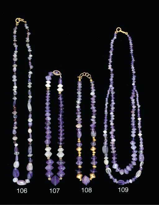 AN ANCIENT AMETHYST AND ROCK CRYSTAL BEAD NECKLACE