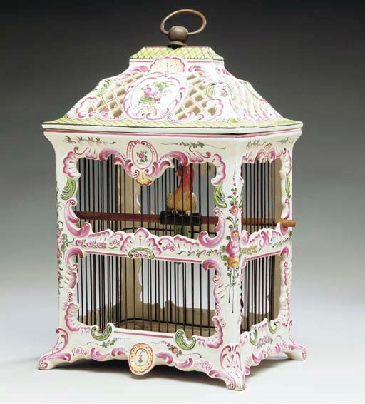 A FAIENCE BIRDCAGE,