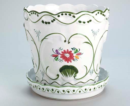A PAIR OF CONTINENTAL EARTHENWARE CACHEPOTS AND UNDERTRAYS,