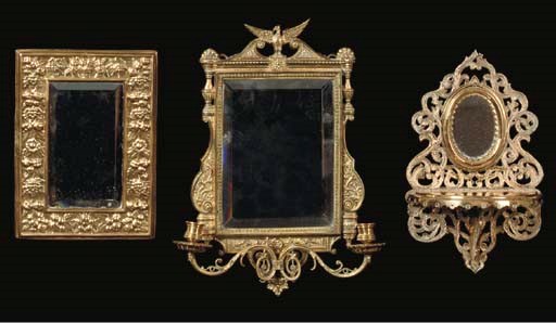 A GROUP OF VICTORIAN BRASS MOUNTED MIRRORS AND WALL POCKETS,