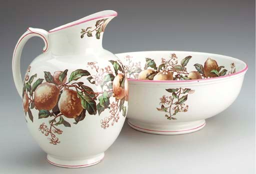 AN ENGLISH EARTHENWARE TRANSFER DECORATED EWER AND BASIN,