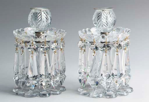 A PAIR OF VICTORIAN COLORLESS GLASS CANDLESTICKS WITH LUSTRES,