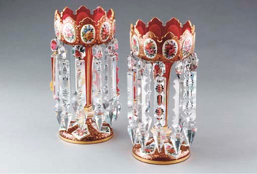 A PAIR OF BOHEMIAN RUBY CUT-TO-MILK GLASS, ENAMELED AND PARCEL GILT DECORATED LUSTRES,