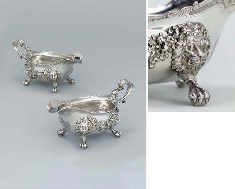 A pair of George II silver sauce-boats