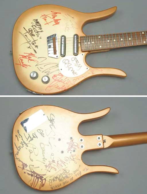 MOTLEY CRUE SIGNED GUITAR