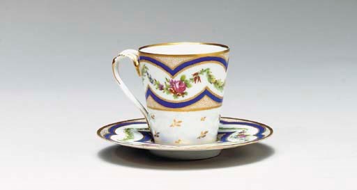A SEVRES STYLE CUP AND SAUCER,