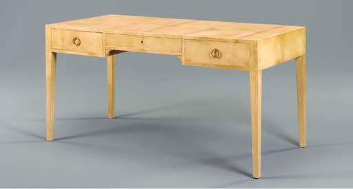A CONTEMPORARY VELLUM-VENEERED WRITING DESK BY LUDWIG AND DOMINIQUE AFTER A DESIGN BY JEAN-MICHEL FRANK,