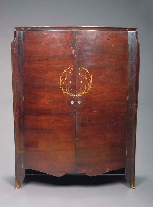 A FRENCH MOTHER-OF-PEARL INLAID AND PARCEL GILT MAHOGANY ARMOIRE,