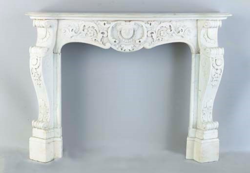 A BAROQUE STYLE WHITE MARBLE FIRE SURROUND,