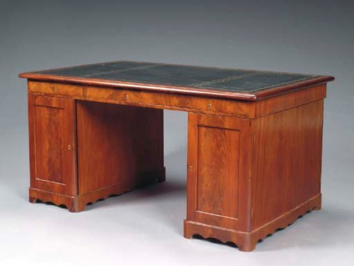 A CONTINENTAL MAHOGANY PARTNERS PEDESTAL DESK