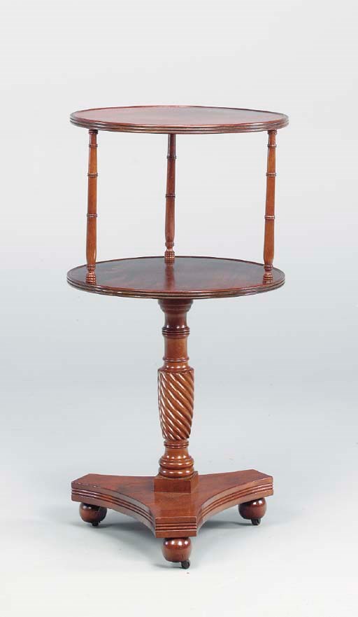 A LATE GEORGE III STYLE MAHOGANY TWO-TIERED REVOLVING DUMBWAITER,