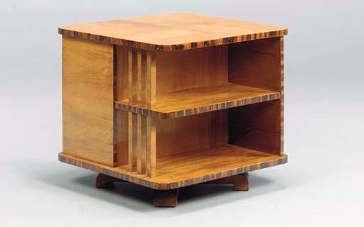 AN ART DECO REVOLVING BOOK STAND,