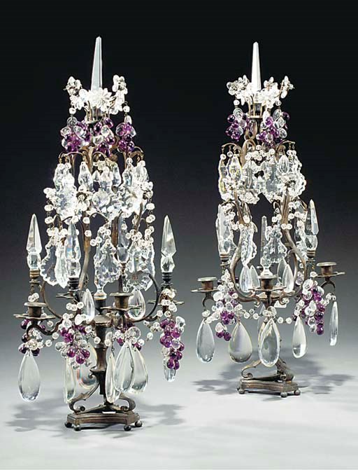 A PAIR OF FRENCH FOUR BRANCH GLASS AND BRONZE CANDELABRA