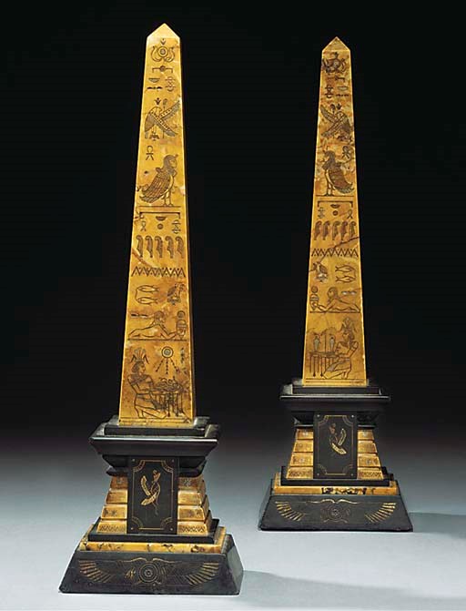 A PAIR OF FRENCH SIENA AND BLACK MARBLE OBELISKS