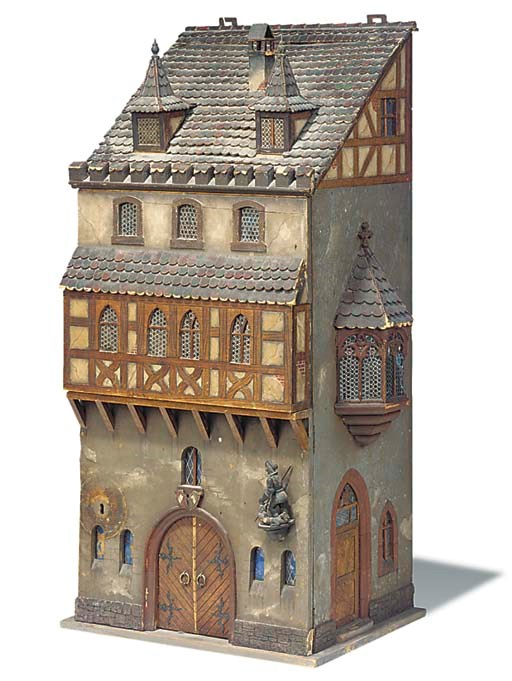 A CONTINENTAL PAINTED WOOD WALL CABINET OF ARCHITECTURAL FORM