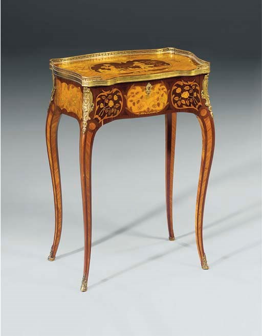 A Louis XV style ormolu-mounted tulipwood, amaranth, satinwood and marquetry lady's writing table