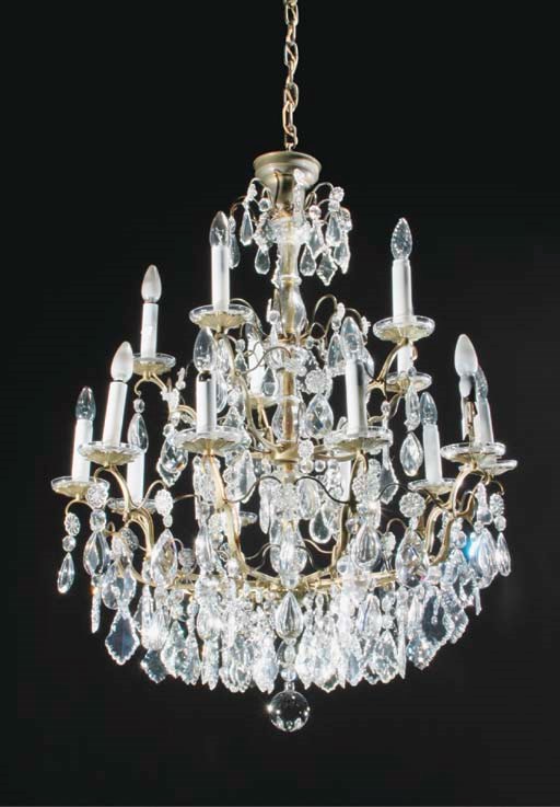 A cut-glass and brass 15-light chandelier