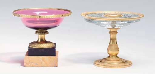 A CHARLES X GILT BRONZE MOUNTED CUT-GLASS TAZZA AND PINK GLASS COMPOTE,
