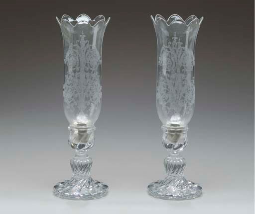 A PAIR OF BACARAT ETCHED GLASS CANDLESTICKS,
