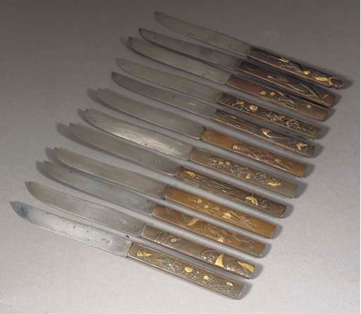 A boxed set of twelve Japanese kozuka handled knives, Meiji period
