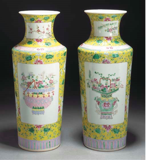 A pair of famille rose, yellow ground tapering vases, 19th century