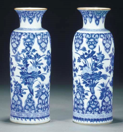 A pair of Chinese blue and white cylindrical vases, Kangxi