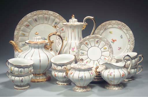 (26) A Meissen porcelain floral gilt coffee service