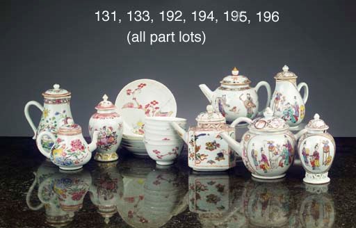 A pair of Chinese famille rose teapots and covers