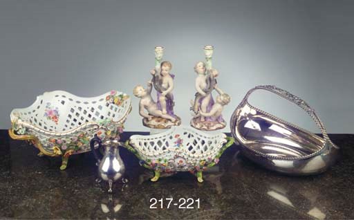 A large Meissen porcelain flower-encrusted outside-decorated ajour basket