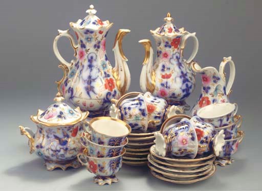 (31) A porcelain heavily gilt Imari-pattern coffee and tea service