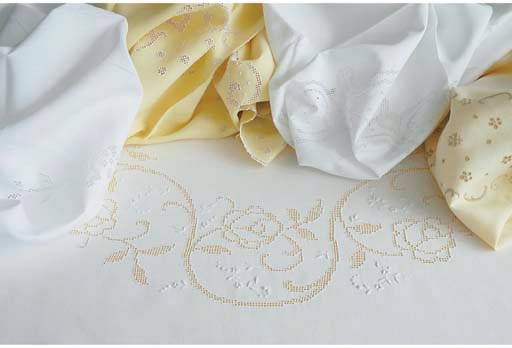 Five various square embroidered and openworked tablecloths