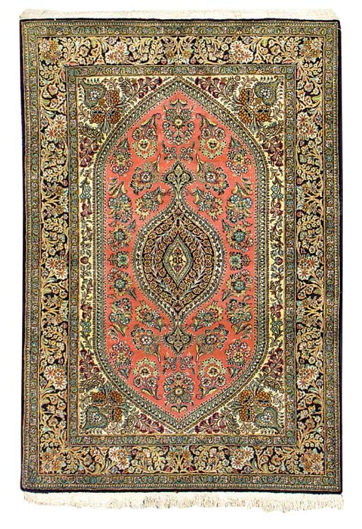 A fine silk Qum rug