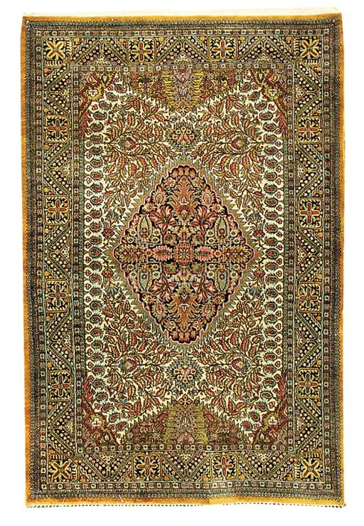 A fine silk Qum rug