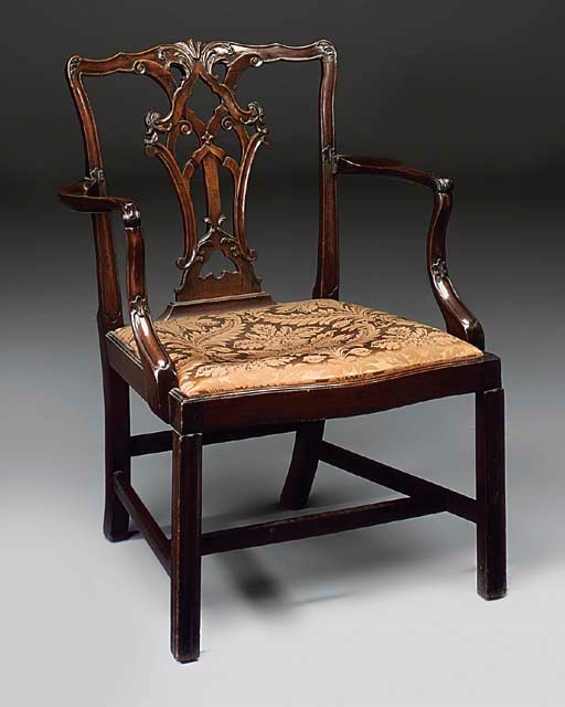 A MAHOGANY OPEN ARMCHAIR