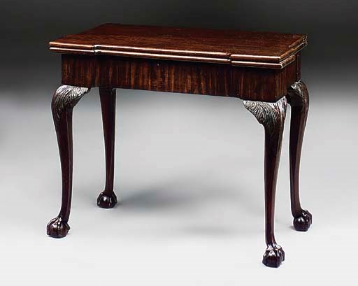 A MAHOGANY TEA TABLE