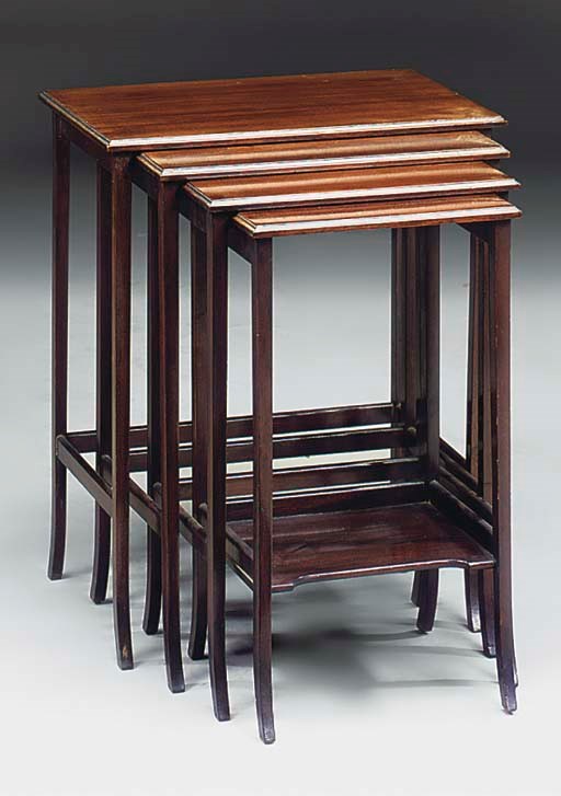 A SET OF EDWARDIAN MAHOGANY QUARTETTO TABLES