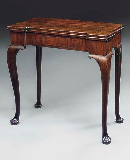 A MAHOGANY CARD TABLE