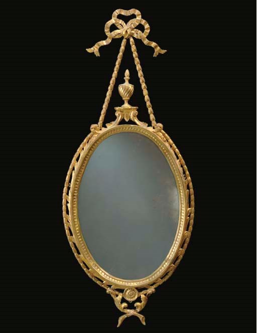 A GEORGE III STYLE GILTWOOD WALL MIRROR