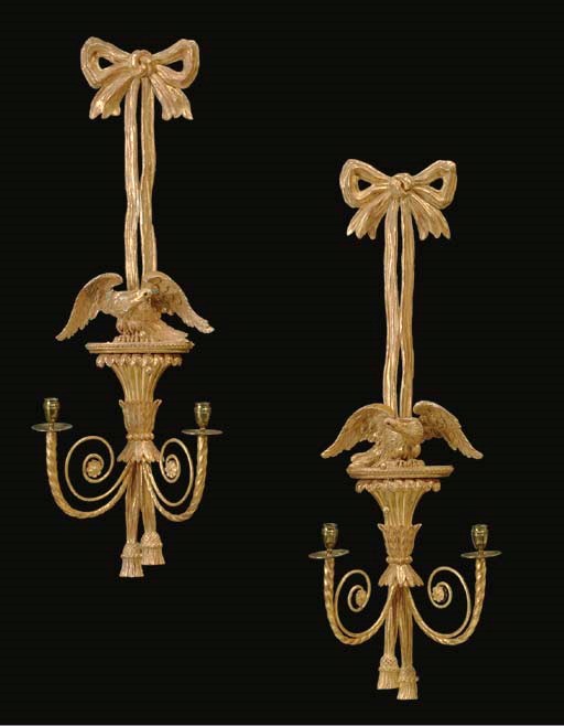 A PAIR OF REGENCY STYLE GILTWOOD TWIN-BRANCH WALL-LIGHTS