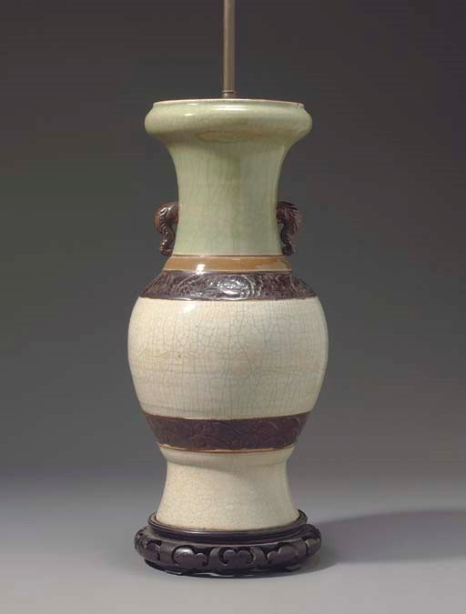 A CELADON CRACKLE GLAZE BALUSTER VASE MOUNTED AS A LAMP
