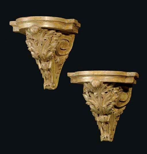 A PAIR OF PART-SILVERED BRACKETS