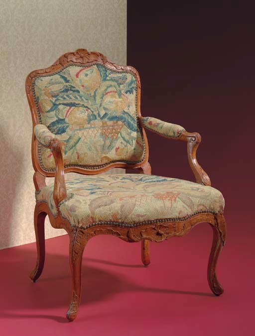 A LOUIS XV BEECHWOOD FAUTEUIL