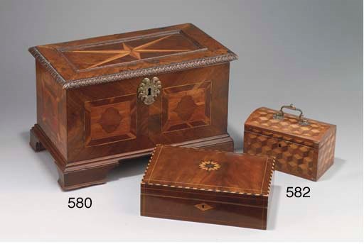 A Dutch mahogany, teak, fruitwood and parquetry tea caddy