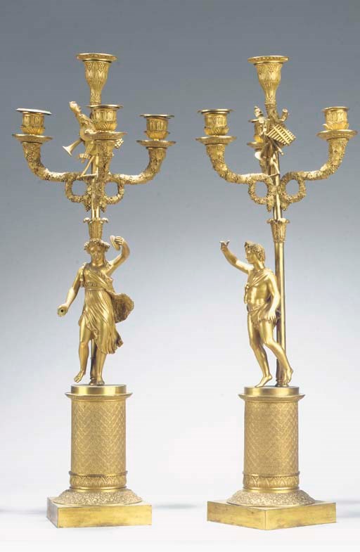 A pair of Charles X ormolu four-light figural candelabra