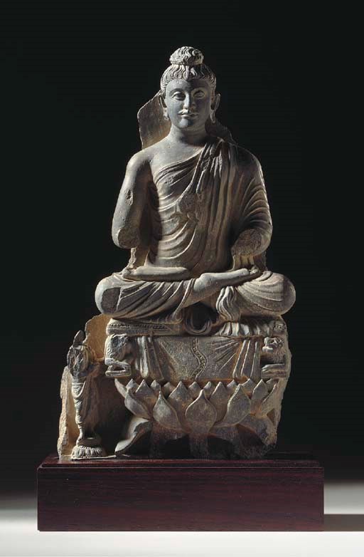A Gray Schist Figure of Buddha on Lotus Throne
